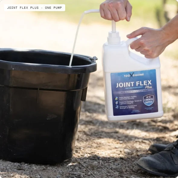 One pump of Joint Flex Plus being dispensed into a rubber feed bucket